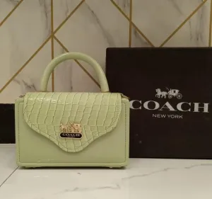 Coach Women's Handbag - Compact Size, Stylish Side Body (Green)